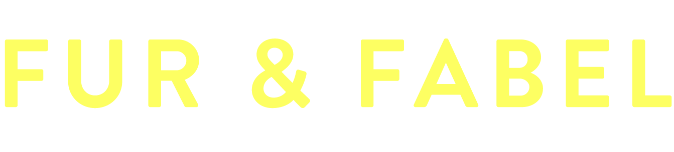 Fur & Fabel logo in yellow text on a white background